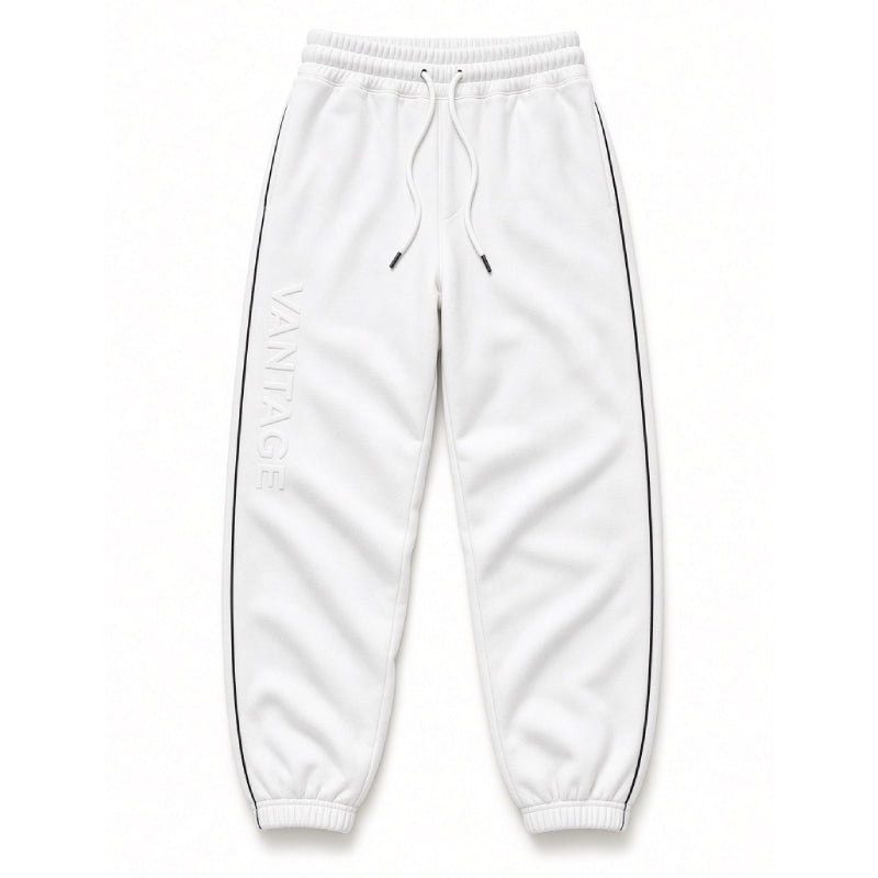 White jogger sweatpants with a vertical 'VANTAGE' logo printed on the left leg, featuring a drawstring waist and black side piping, shown against a plain white background.