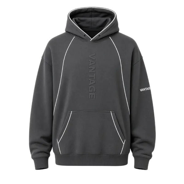 A dark gray pullover hoodie with white contrast piping details, featuring a vertical 'VANTAGE' logo on the chest and a smaller logo on the sleeve, shown against a plain white background.